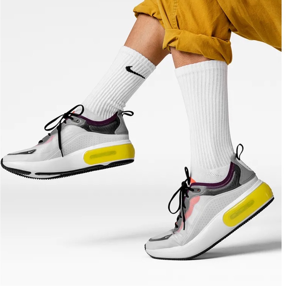 Nike multi-colored running shoes with mesh in women’s size 8!